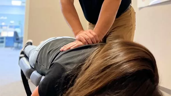 Chiropractor San Antonio TX Vincent Morales Adjusting Patient